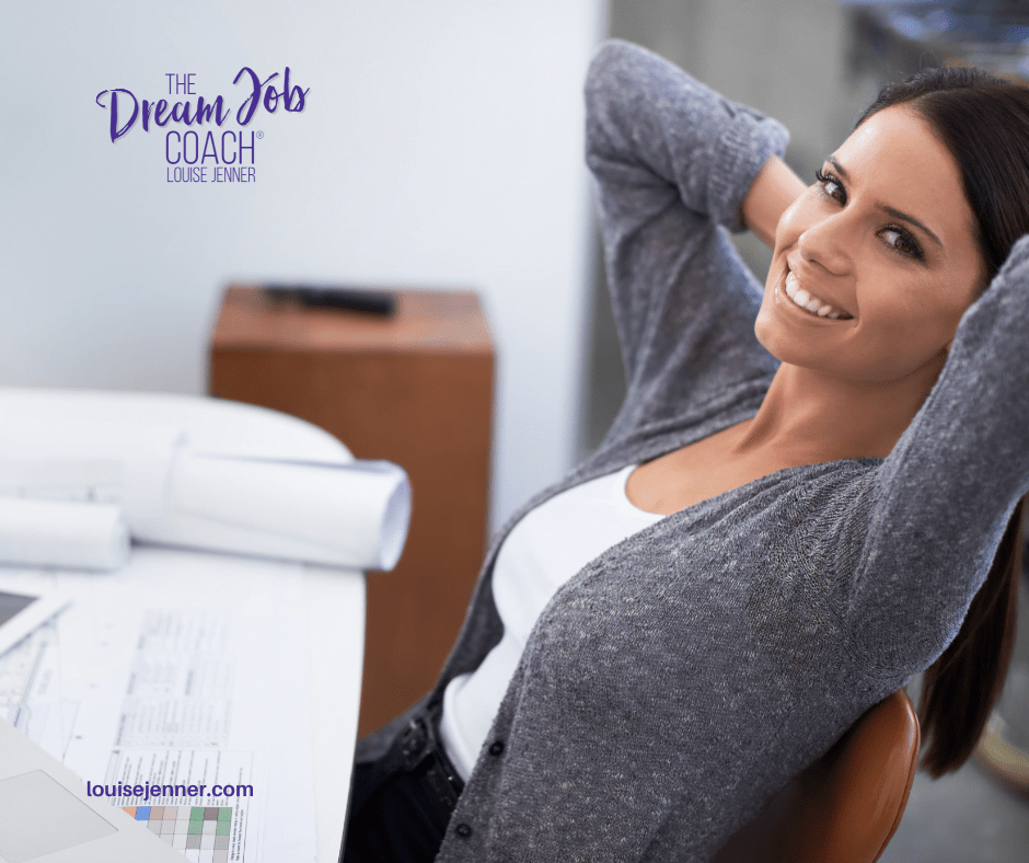 women working at her desk in an office